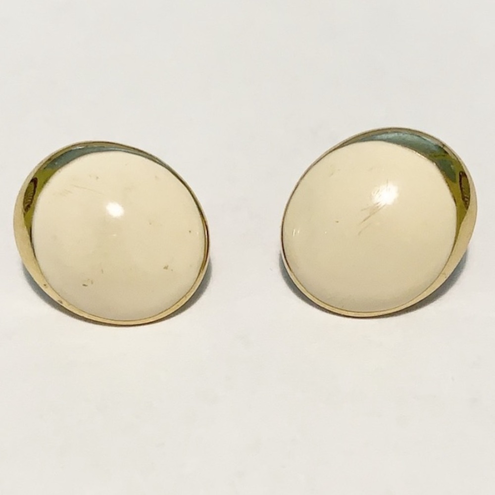 Vintage Monet white gold clip on earrings